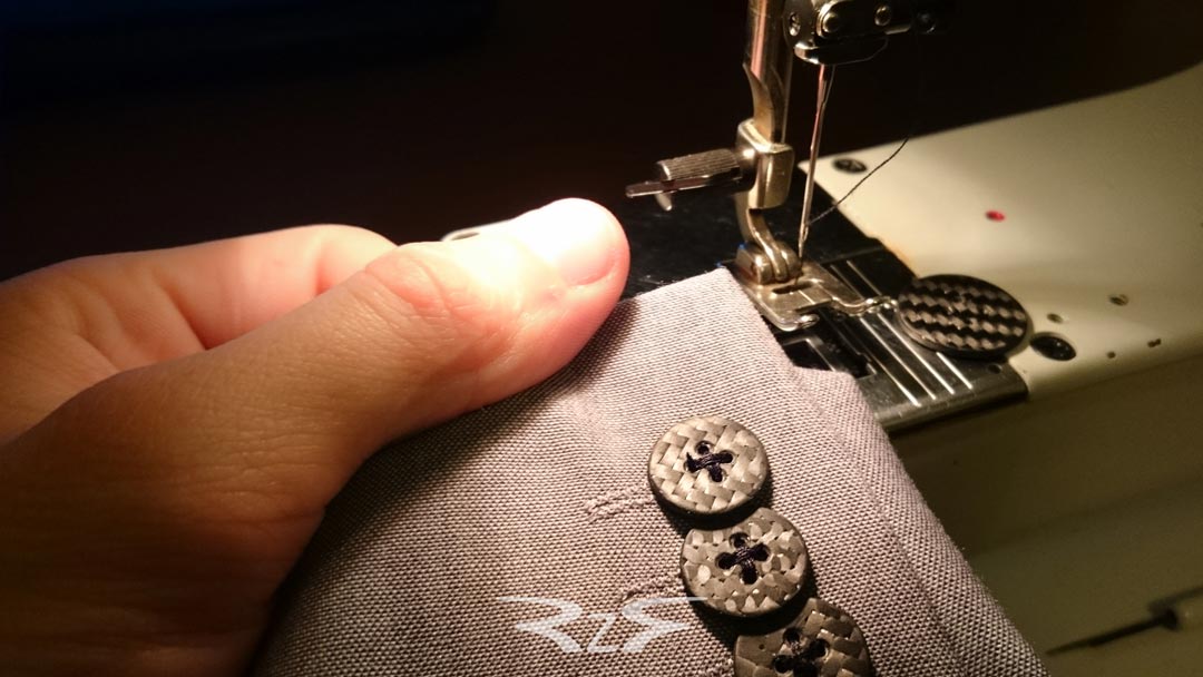 Buttons made of carbon fiber and epoxy.